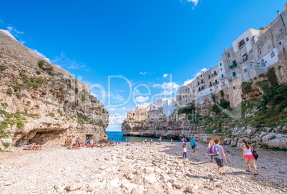 POLIGNANO AL MARE, ITALY - AUGUST 28, 2014: Tourists enjoy the b