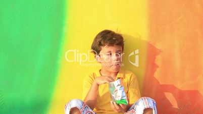 child eating chips