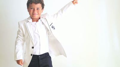 Little boy dancing and pointing