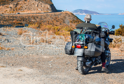 Motorbike travel and adventure on the shore of beautiful coast