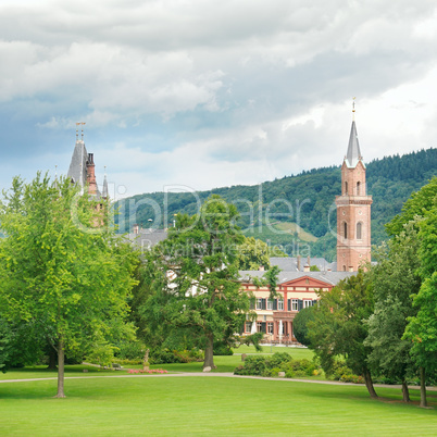 city park with lawns and castle