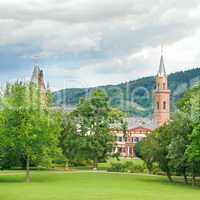 city park with lawns and castle