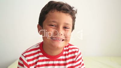 Child showing missing teeth