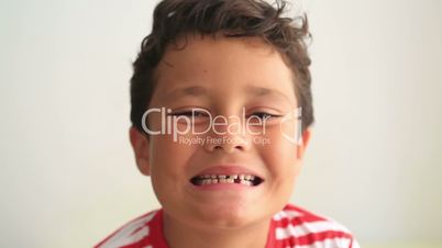 Child showing missing teeth