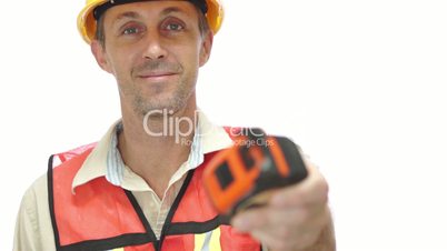 Male Tradesman Passing Tape Measure