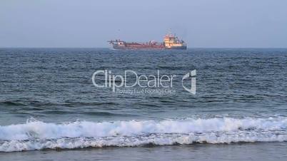 merchant ship in the vast ocean