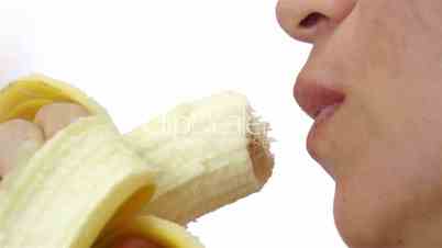 Female Eating a Healthy Banana Closeup