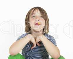 boy eats gummy bears