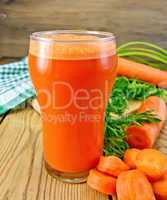 Juice carrot with napkin on board