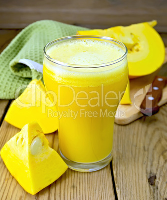 Juice pumpkin with napkin on board