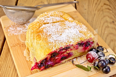 Strudel with black currants on board