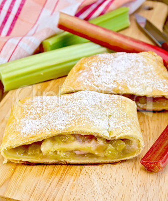 Strudel with rhubarb and napkin on board