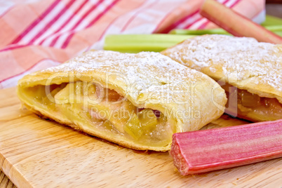 Strudel with rhubarb on linen tablecloth