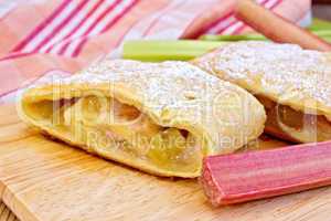 Strudel with rhubarb on linen tablecloth