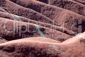 Red clay badlands dunes