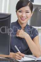 Asian Chinese Woman or Businesswoman in Office