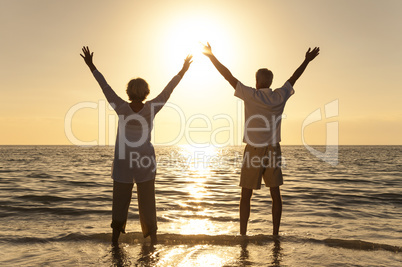 Senior Man & Woman Couple Sunset on Beach