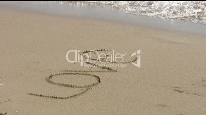 Love  written on sand