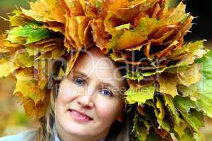 woman with yellow leaves on the head