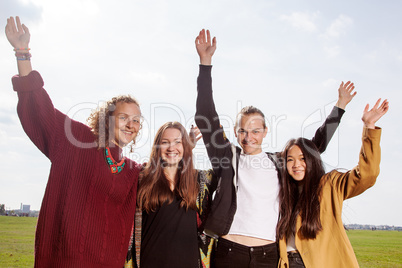 Group of young people at the waving