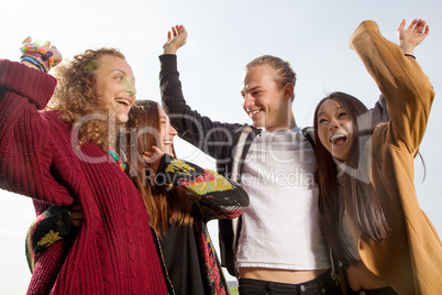 Group of young people at the waving