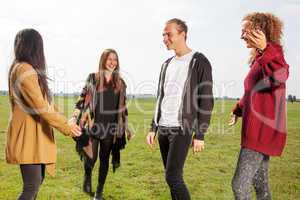 Group of young people outside in the park