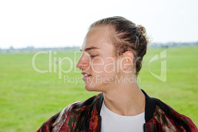 Portrait of a young man in the park