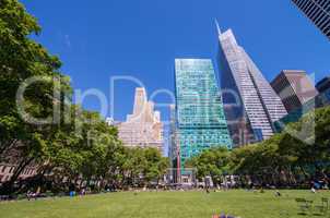Bryant Park on a wonderful spring day. Tourists relaxing on the