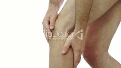 Male Rubs His Knee Joint Pain