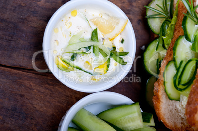 fresh vegetarian sandwich with garlic cheese dip salad