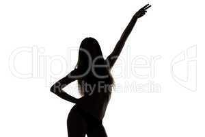 Silhouette of dancing girl with hand up