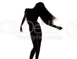 Silhouette of young dancing girl