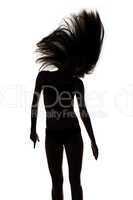 Silhouette of dancing girl with waving hair