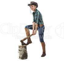 Photo of young woman chops wood