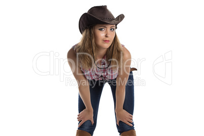 Portrait of young woman in cowboy hat