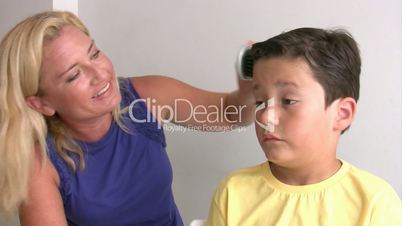 Mother Combing Little Boy's Hair