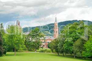 city park with lawns and castle