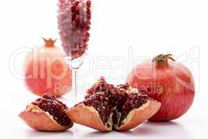 Pomegranate and its seeds.