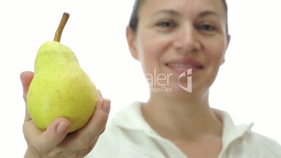 Woman Giving a Bartlett Williams Pear