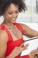 Mixed Race African American Girl Using Tablet Computer