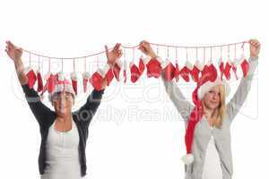 Weihnachtsfrauen mit Adventskalender