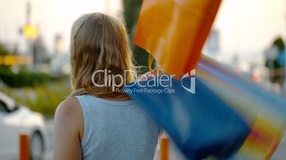 Smiling woman with shopping bags outdoor