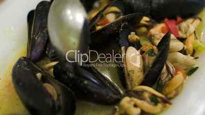 Eating dish with mussels
