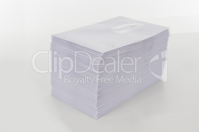 Stack of Envelopes on White