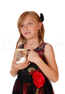 Girl holding a mug.