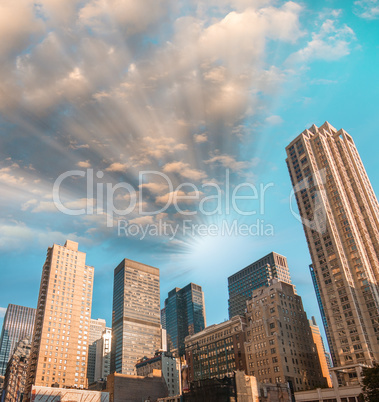 Manhattan skyline against a beautiful blue sky