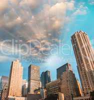 Manhattan skyline against a beautiful blue sky