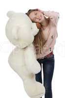 Photo of happy teenage girl with teddy bear