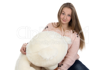 Portrait of teenage girl with teddy bear