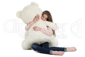 Image of teenage girl with teddy bear